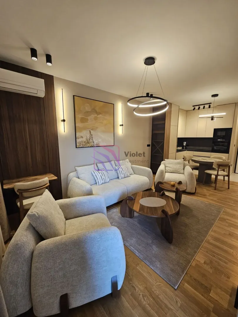 Spacious living room connected with the kitchen and dining area.