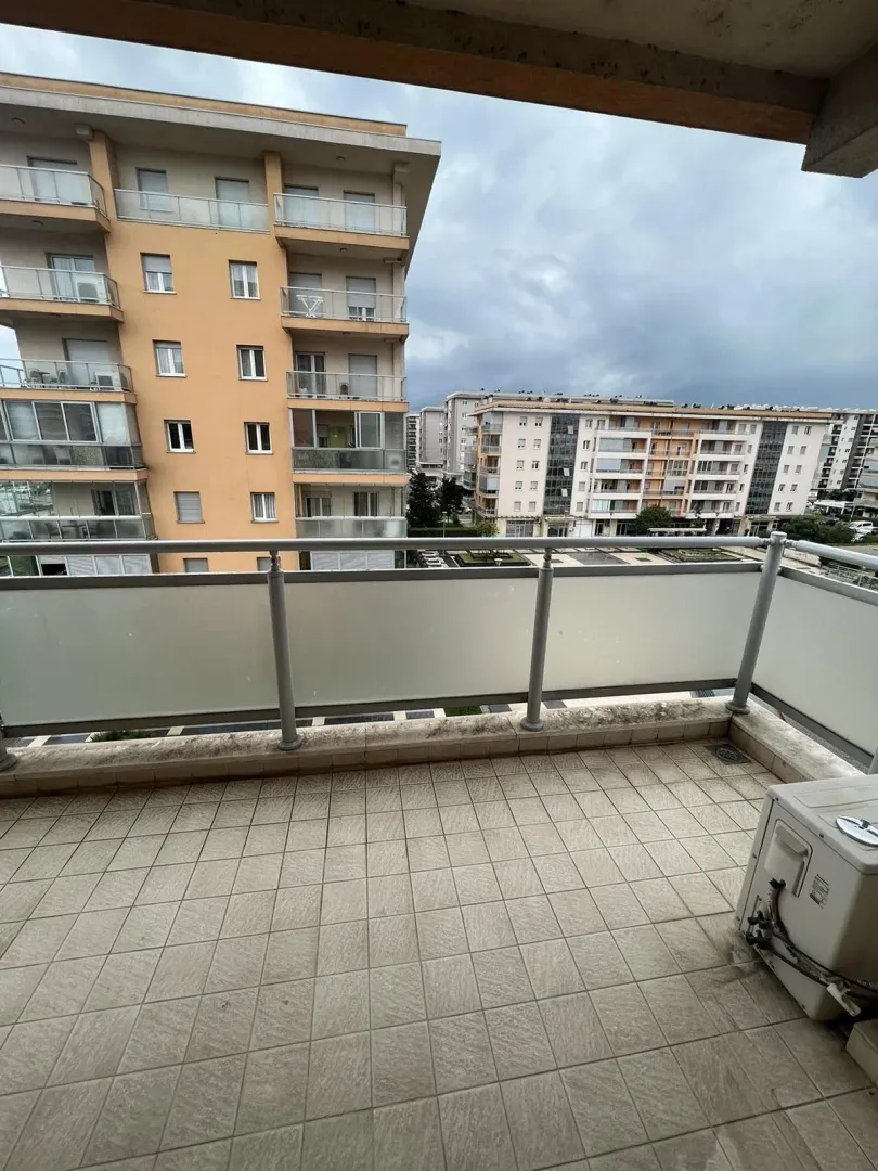 Terrace with a view of surrounding buildings.