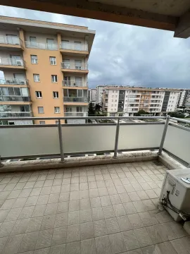 Terrace with a view of surrounding buildings. - image 7