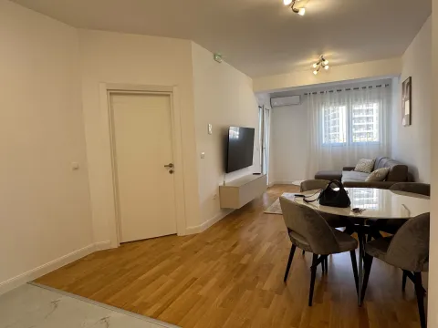 Living room with dining area and sofa. - image 5