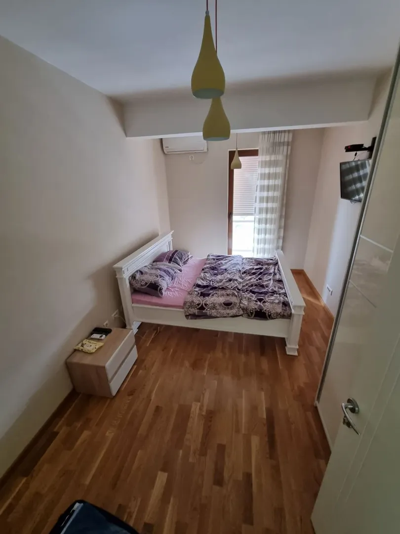 Simple bedroom with a double bed.