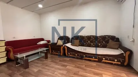 Living room with sofas and a coffee table. - image 3