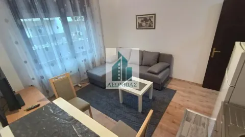 Living room with a sofa set and a dining table. - image 4