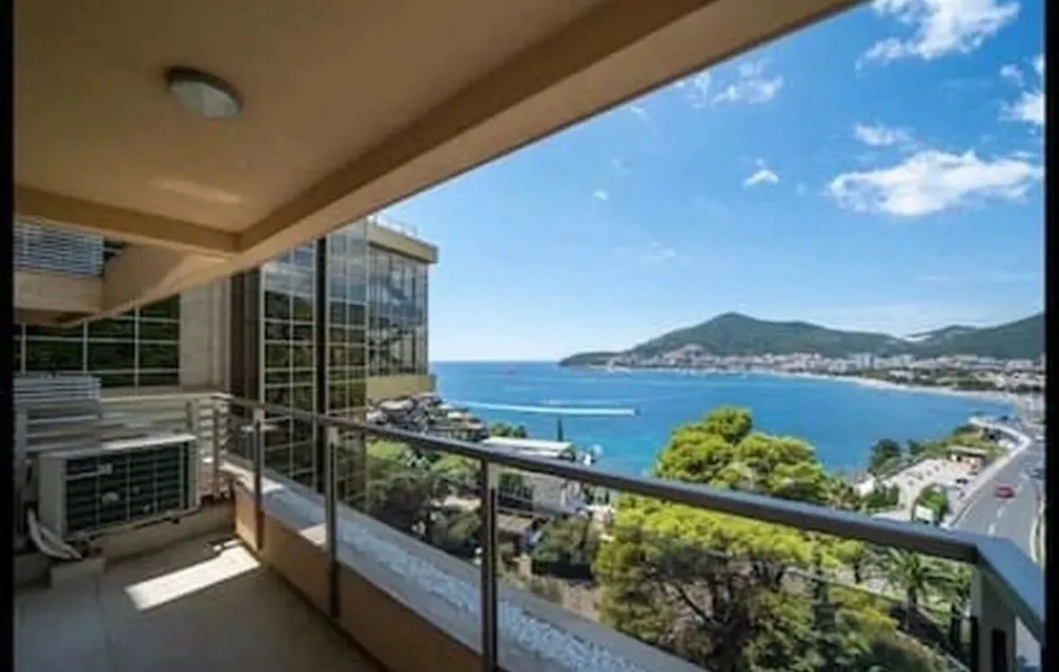 Terrace with a view of the sea and coastline.