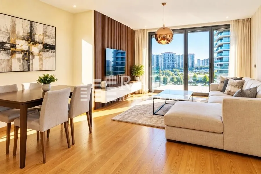 Spacious living room connected to the dining area with access to the terrace.