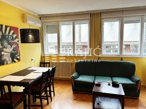 Living room with a dining area and sofa set. - image 12