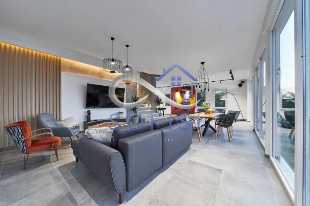Spacious living room with a dining area and modern furniture.