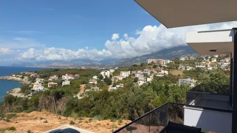 Pogled na more i okolno naselje sa terase. - image 9