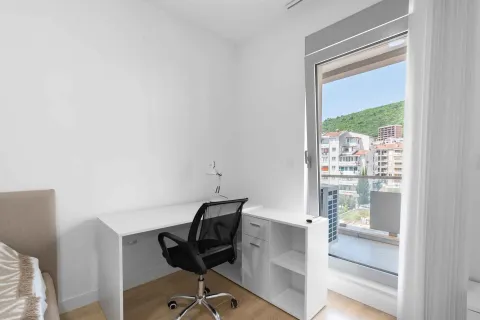 Bright bedroom with a desk and access to the terrace. - image 20