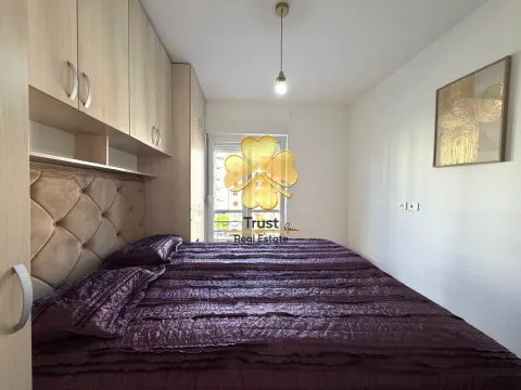 Furnished bedroom with a double bed and built-in wardrobes. - image 14