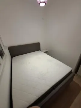 Smaller bedroom with a double bed. - image 12