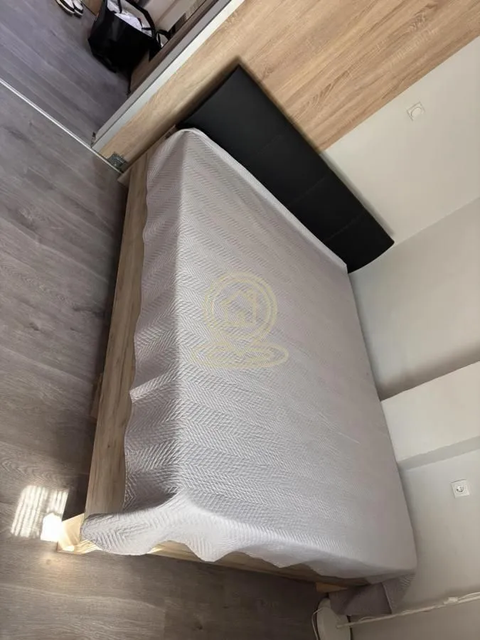 Smaller bedroom with a double bed.