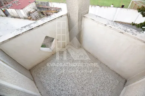 View of an unfurnished balcony with a concrete railing. - image 15