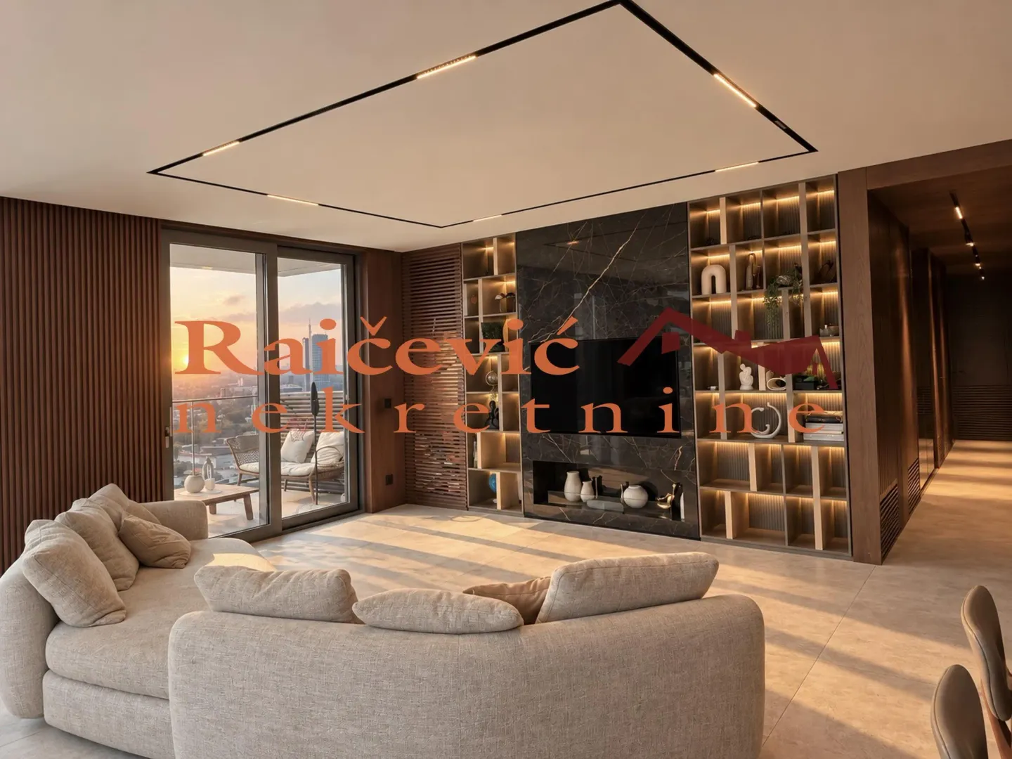Living room with a sofa, built-in shelving, and access to a terrace with a view.