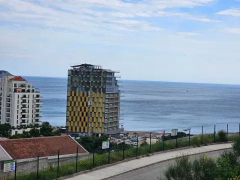 View of the sea and surrounding buildings from the terrace. - image 4