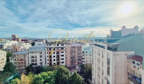 View from the window overlooking city buildings and surroundings. - image 12
