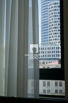 View through the window of surrounding buildings and cityscape. - image 4