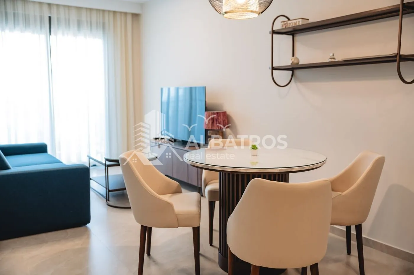 Living room with a dining table and chairs.