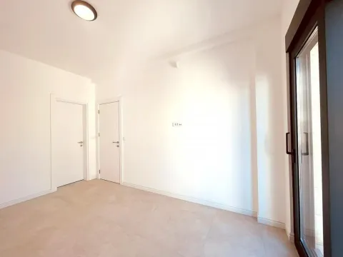 Empty bright room with white walls and doors. - image 3