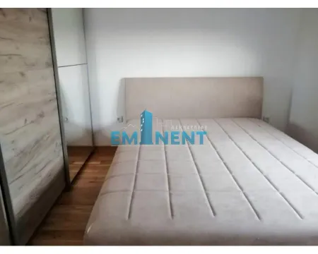 Furnished bedroom with a double bed and a fitted wardrobe. - image 9