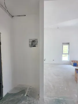 Empty room under renovation with white walls. - image 5