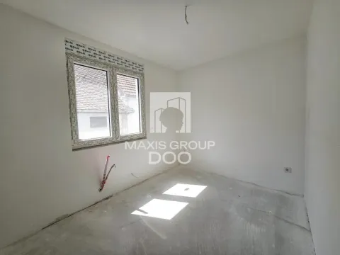 Empty unfinished room with a window in a building under construction. - image 3