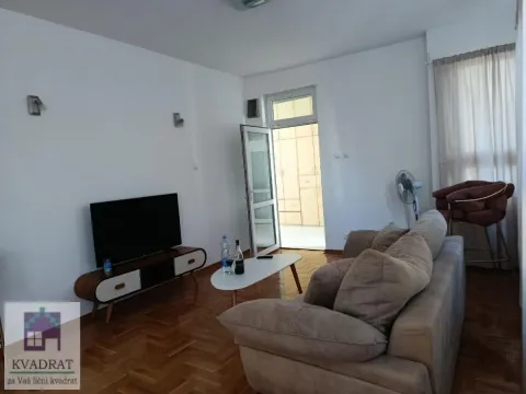 Living room with sofa, TV and access to the terrace. - image 3