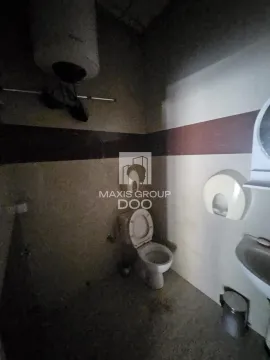 Small bathroom with a toilet and a sink. - image 6