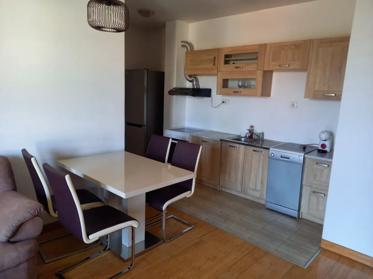 Bright kitchen with a dining table.