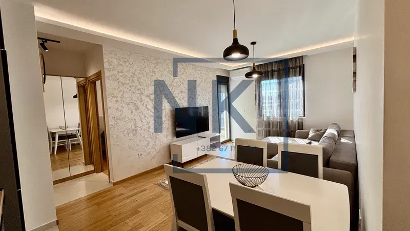 Living room with a dining area and seating set.