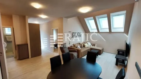 Spacious living room with dining area and skylights. - image 2