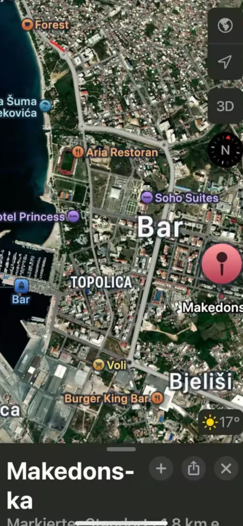 Satellite imagery of the location with a city map.