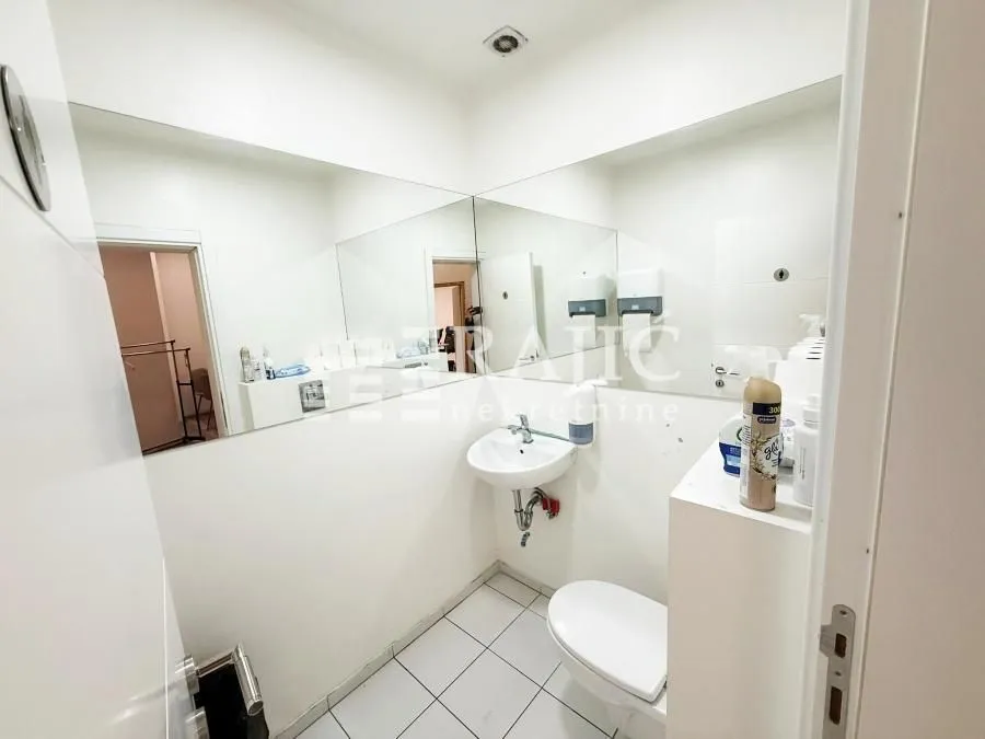 Small bathroom with a sink and toilet.