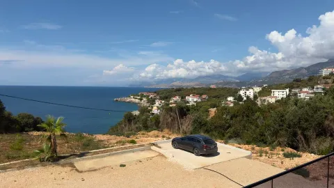 Pogled na more i obalu sa terase nekretnine. - image 9
