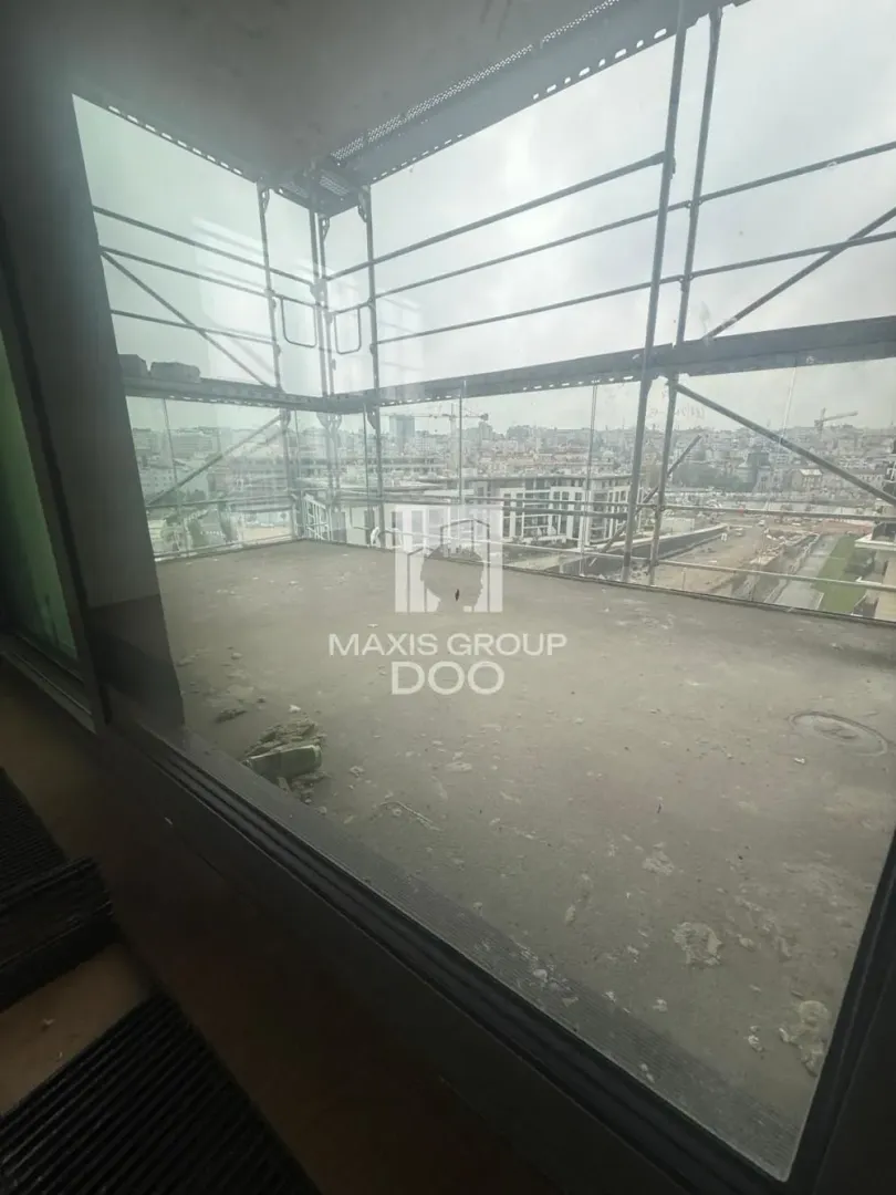 Unfinished balcony with city view.