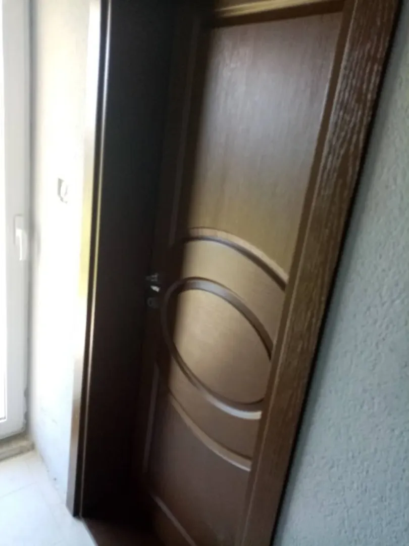 An interior wooden door.