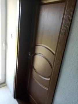 An interior wooden door. - image 13