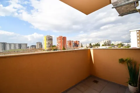 View of the city neighborhood from the balcony. - image 5