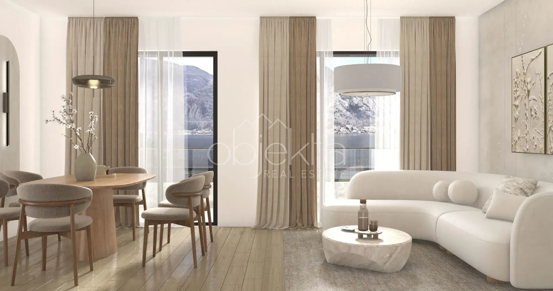 Living room with dining area and sea view through large windows.