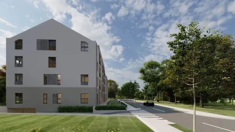 Exterior view of an apartment building with surrounding landscaping and road. - image 4