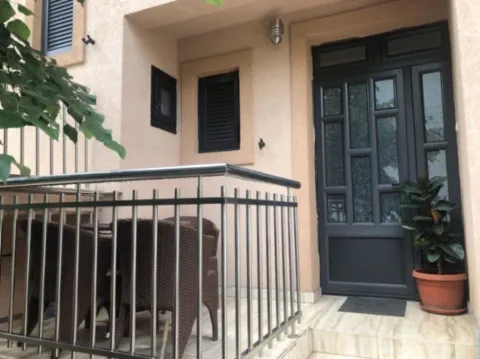 Entrance door with a small terrace in front. - image 2