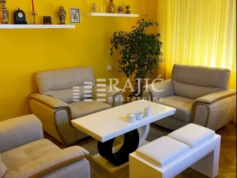 Furnished living room with a sofa set and a coffee table. - image 2