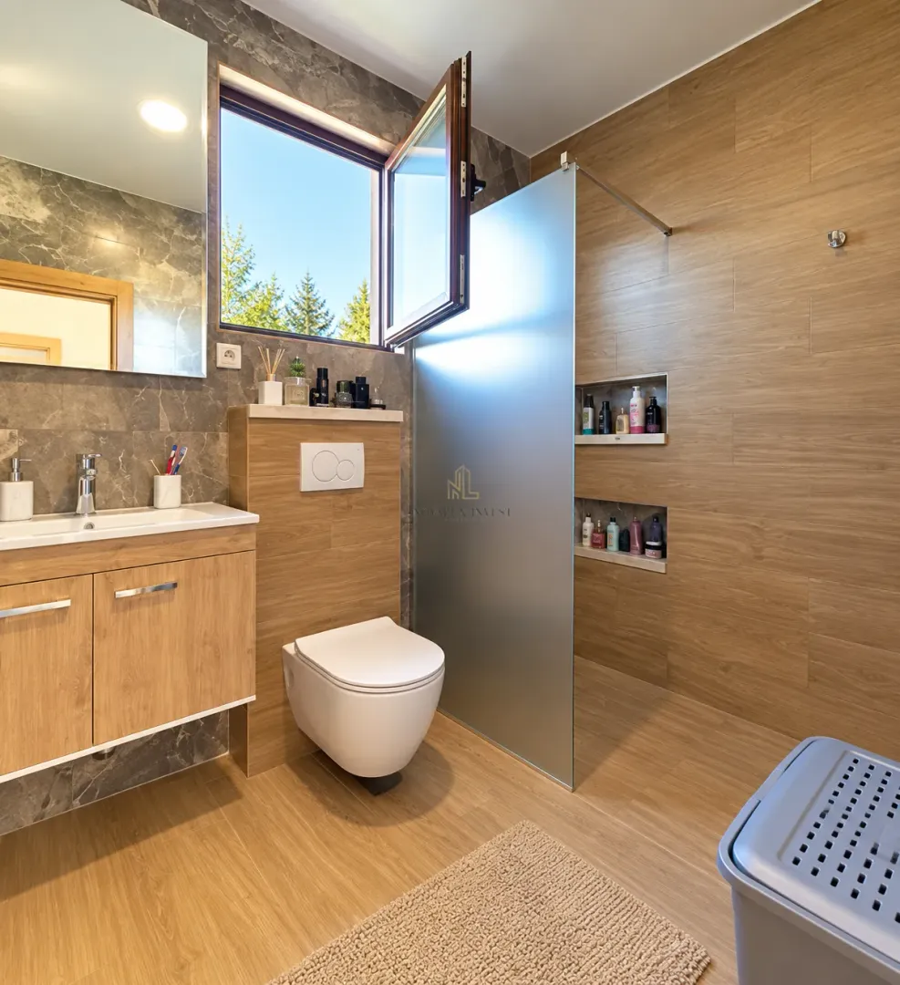 Modern bathroom featuring wood-effect tiles, wall-hung toilet, and a walk-in shower.