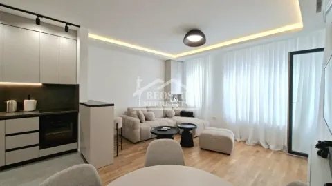 Moderan dnevni boravak sa kuhinjom i trpezarijom u otvorenom planu. - image 3