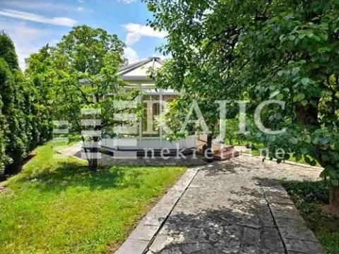 View of a beautifully landscaped yard with a walkway and a gazebo. - image 10