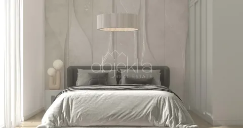 Modern bedroom with a double bed and decorative lighting. - image 11