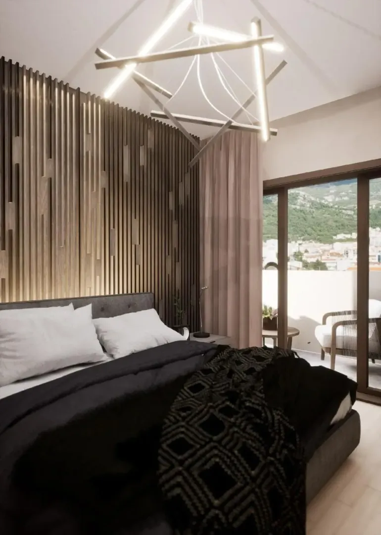 Modern bedroom with a double bed and a wooden wall panel.