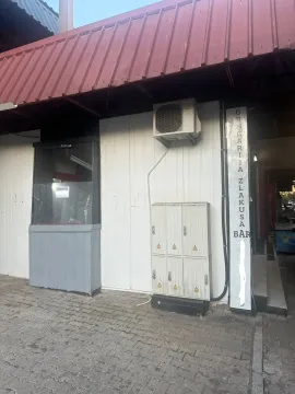 Exterior view of the commercial space with a canopy and entrance. - image 5