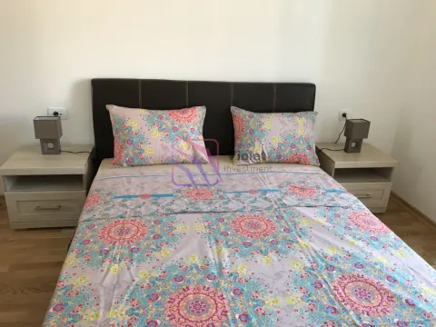 Furnished bedroom with a double bed and two nightstands. - image 16