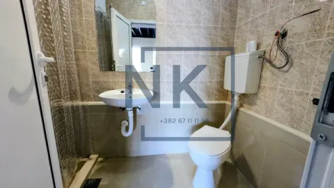 Smaller bathroom with a washbasin and toilet bowl. - image 9